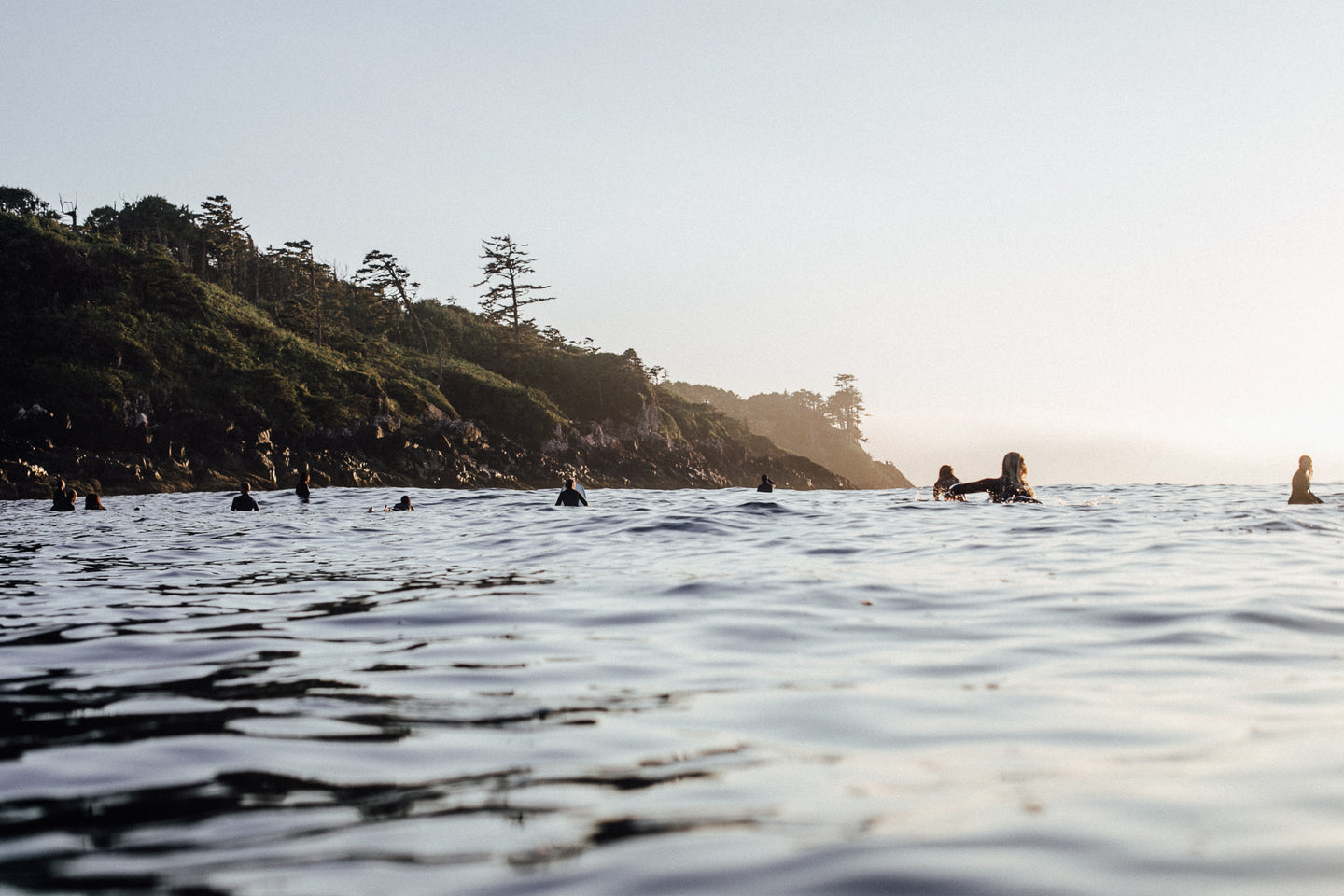 Surfing in Tofino with pacific surf school, offering surf lessons and surf rentals. 